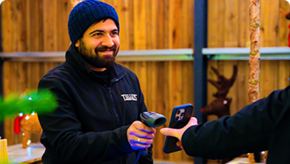 A man working on a checkout
